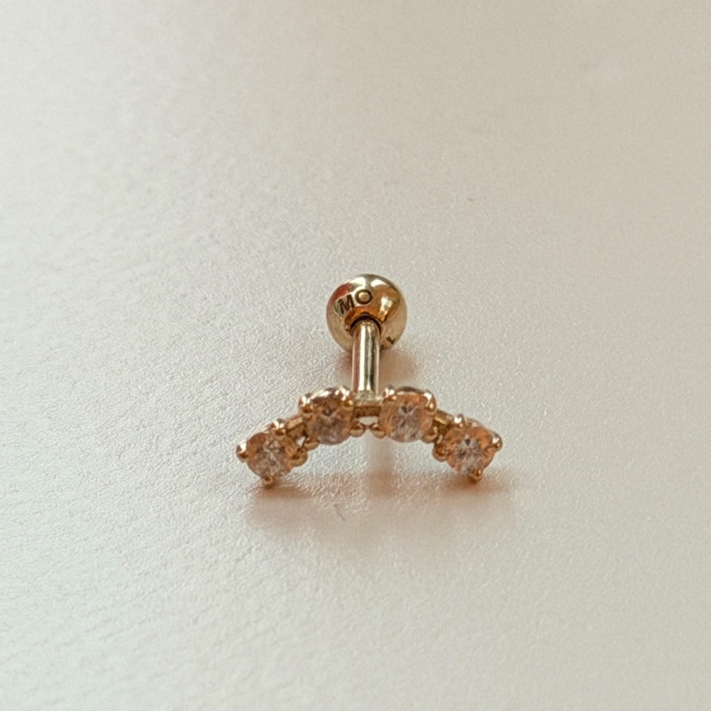 14k Yellow Gold Curved Bar Cartilage Earring.